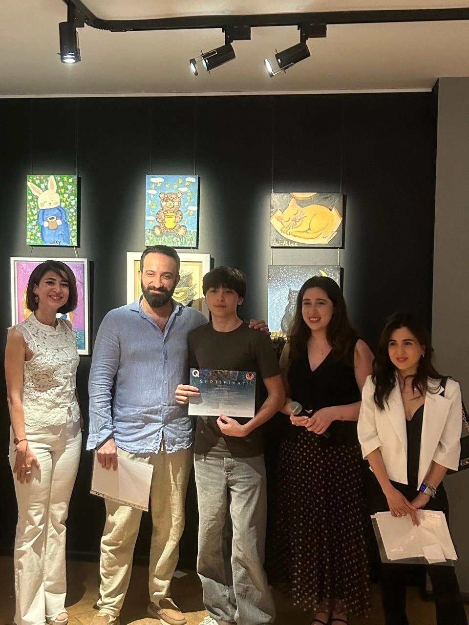 Zeyd Suleymanli receiving his art certificate